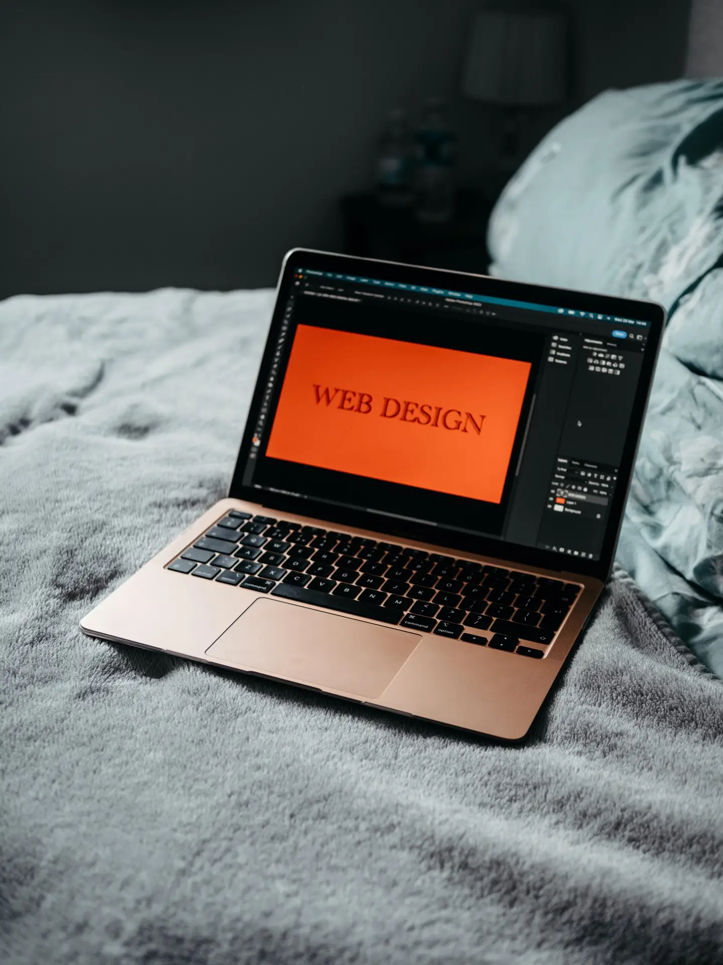 Website Design on Laptop with orange background